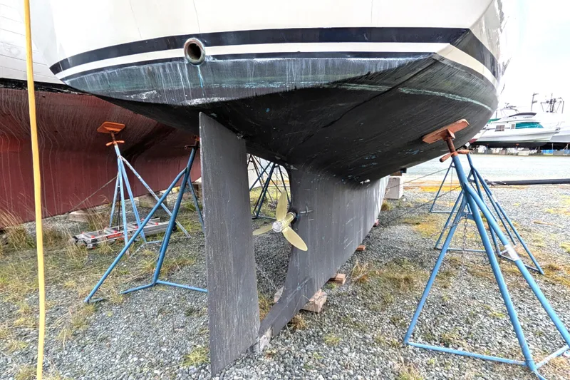 Firefly Yacht Photos Pics 1985 Siltala Nauticat 44 sailboat on stands, showing hull and propeller.