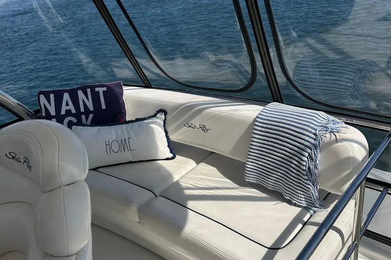 Knot Available Yacht Photos Pics Luxurious 2005 Sea Ray 500 Sedan Bridge interior with cushions and ocean view.