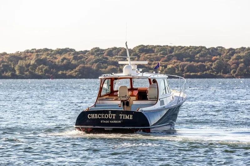 Checkout Time Yacht Photos Pics 2007 Hinckley Talaria 40 yacht cruising on water, "Checkout Time" at Stage Harbor.