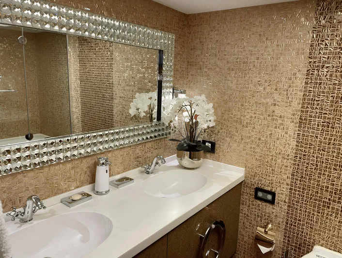  Yacht Photos Pics Luxurious bathroom with dual sinks, ornate mirror, and elegant floral arrangement, Custom model 34, 2008.