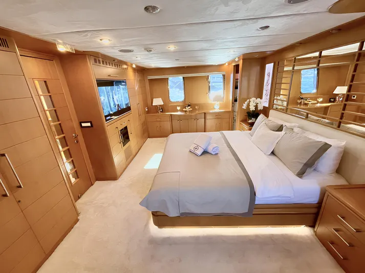  Yacht Photos Pics Luxurious yacht bedroom with modern decor, custom wood finishes, and ambient lighting, 2008 model.