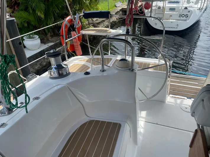 Sailing Diver Yacht Photos Pics 2010 Hunter 49 Aft Cockpit sailboat with steering wheel and deck view.