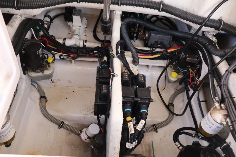  Yacht Photos Pics Engine compartment of a 2012 Donzi 38 ZF boat, showcasing wiring and components.