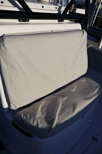  Yacht Photos Pics 2012 Donzi 38 ZF boat seat with protective cover in sunlight.