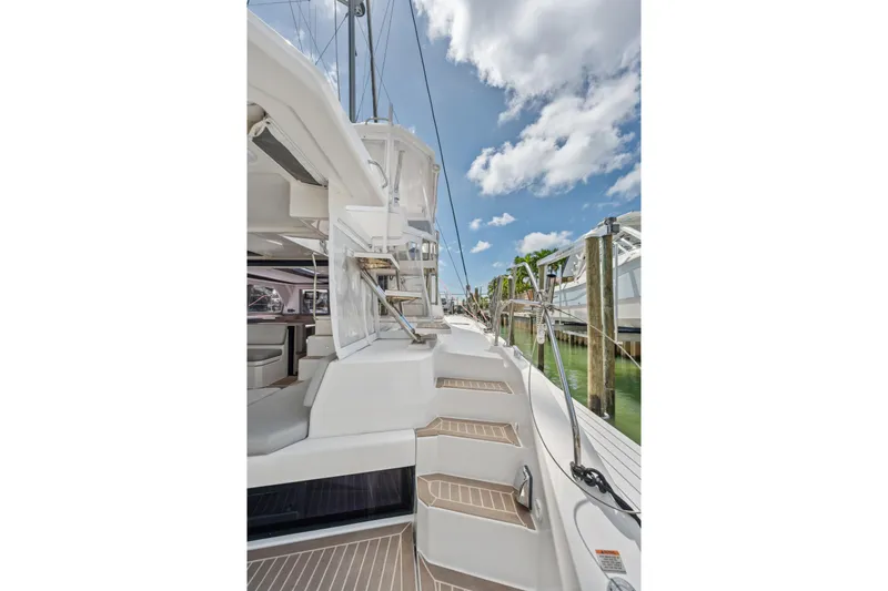 Always Wet Yacht Photos Pics Leopard 45 catamaran deck view, showcasing modern design and clear skies.