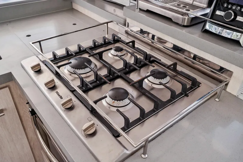 Always Wet Yacht Photos Pics Modern kitchen with Miele gas stove on Leopard 45, 2021 model yacht.