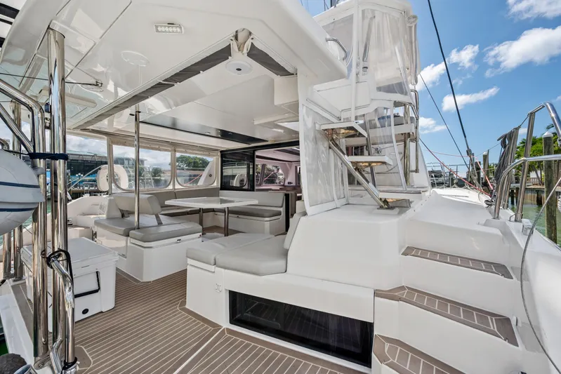Always Wet Yacht Photos Pics Luxurious 2021 Leopard 45 catamaran with spacious outdoor seating and modern design.