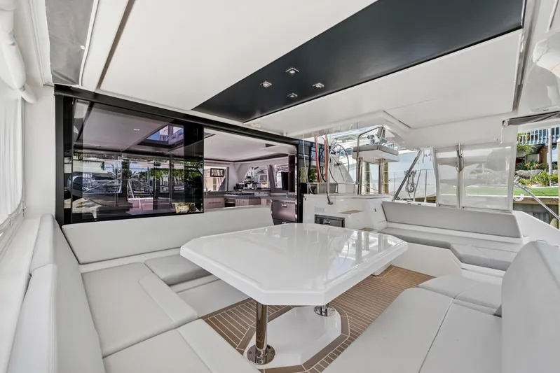 Always Wet Yacht Photos Pics Luxurious 2021 Leopard 45 yacht interior with sleek seating and modern design.