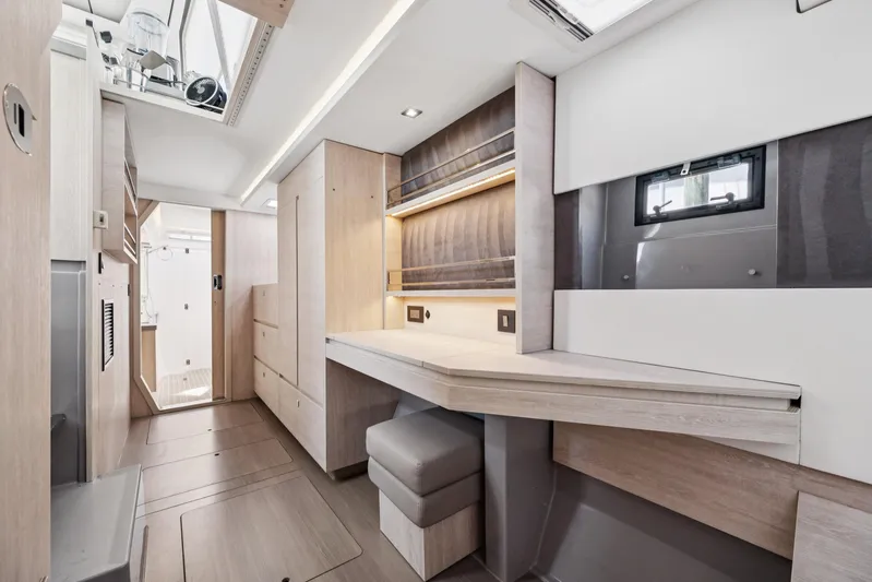 Always Wet Yacht Photos Pics Modern interior of 2021 Leopard 45 yacht with sleek design and natural lighting.