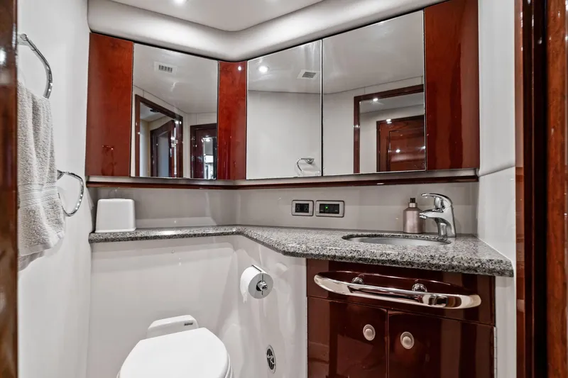 Sea-dels Yacht Photos Pics Luxurious bathroom in 2007 Sea Ray 58 Sedan Bridge yacht with granite countertop.