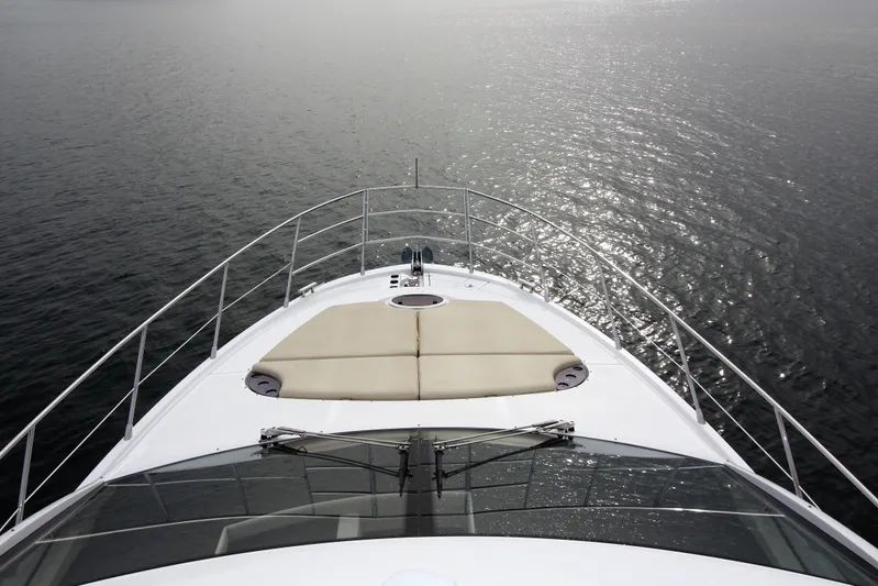 Raven Yacht Photos Pics 2014 Azimut 54 Fly Bridge yacht cruising on calm waters.