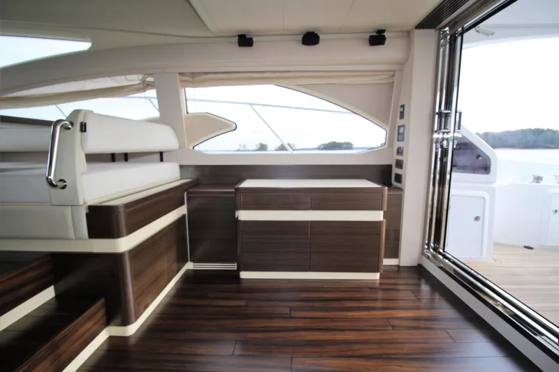 Raven Yacht Photos Pics Interior of 2014 Azimut 54 Fly Bridge yacht with sleek wood finishes and modern design.