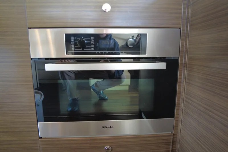 Raven Yacht Photos Pics Modern Miele oven in 2014 Azimut 54 Fly Bridge yacht kitchen.