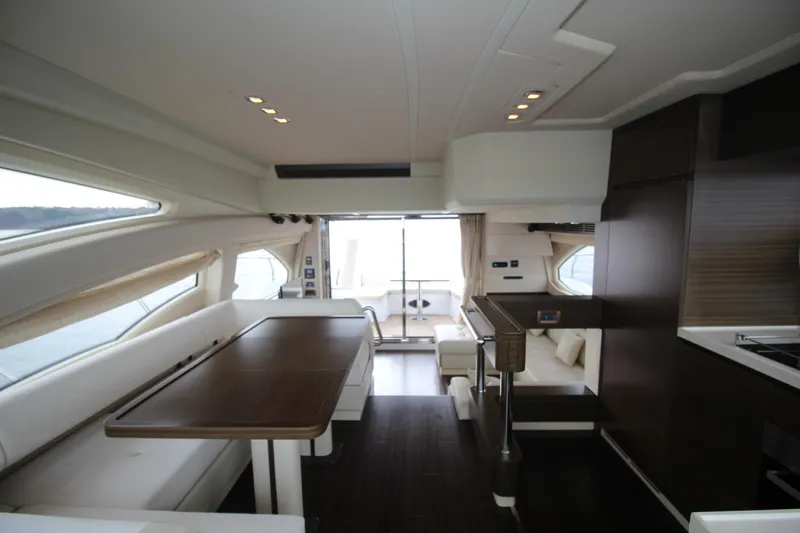 Raven Yacht Photos Pics Luxurious interior of 2014 Azimut 54 Fly Bridge yacht with modern furnishings.