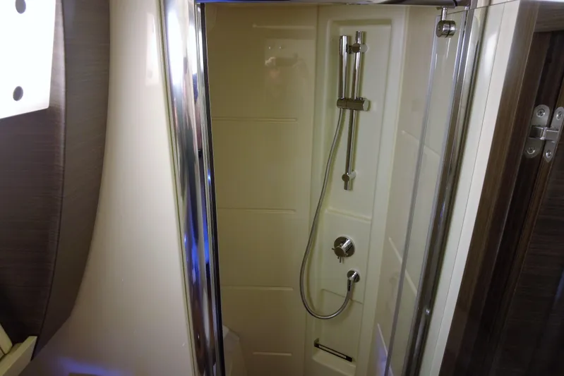 Raven Yacht Photos Pics Shower area in 2014 Azimut 54 Fly Bridge yacht, featuring modern fixtures and sleek design.