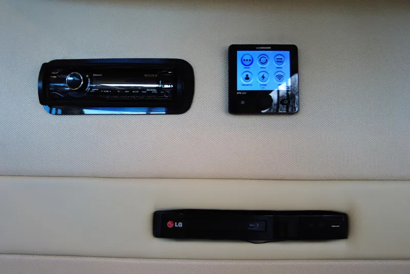 Raven Yacht Photos Pics 2014 Azimut 54 Fly Bridge interior with Sony audio system and LG Blu-ray player.