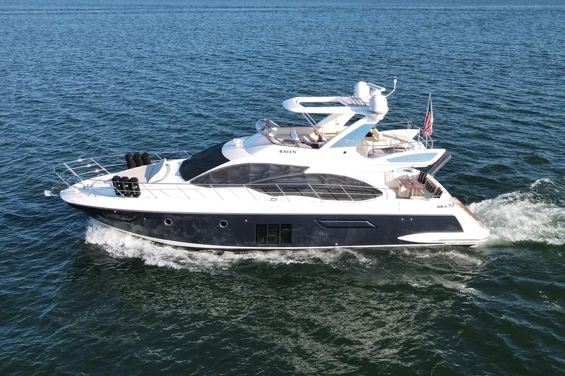 Raven Yacht Photos Pics 2014 Azimut 54 Fly Bridge yacht cruising on open water.