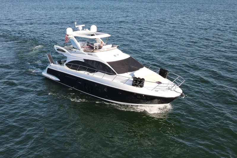 Raven Yacht Photos Pics 2014 Azimut 54 Fly Bridge yacht cruising on open water.