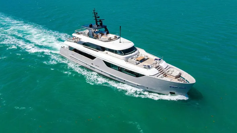 The Wolf Yacht Photos Pics Luxurious 2023 Sanlorenzo SD118 yacht cruising on turquoise waters.