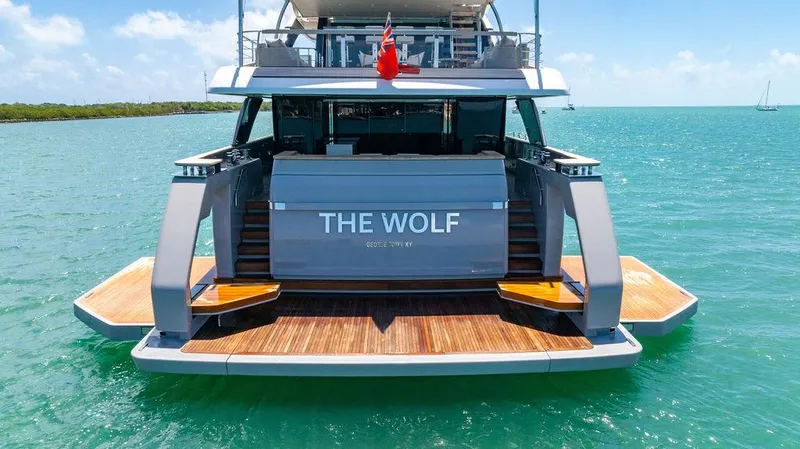 The Wolf Yacht Photos Pics 2023 Sanlorenzo SD118 yacht "The Wolf" on turquoise water, rear view.