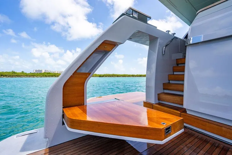 The Wolf Yacht Photos Pics Sanlorenzo SD118 yacht 2023, elegant wooden deck and stairs, ocean view.