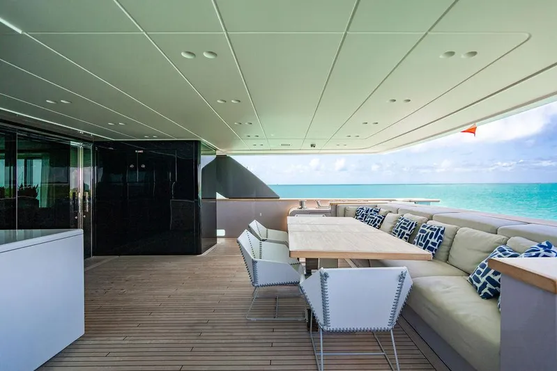 The Wolf Yacht Photos Pics Luxurious 2023 Sanlorenzo SD118 yacht deck with elegant seating and ocean view.