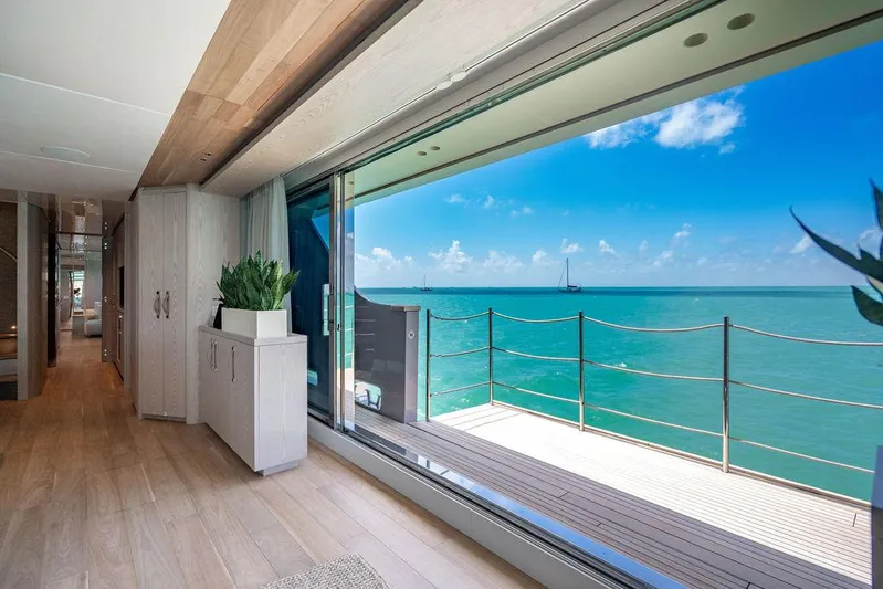 The Wolf Yacht Photos Pics Luxurious interior of 2023 Sanlorenzo SD118 yacht with ocean view through large windows.