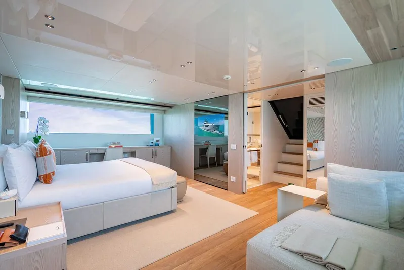 The Wolf Yacht Photos Pics Luxurious Sanlorenzo SD118 yacht bedroom, 2023 model, featuring modern design and elegant furnishings.