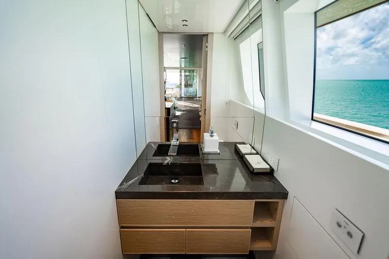 The Wolf Yacht Photos Pics Luxurious bathroom on 2023 Sanlorenzo SD118 yacht with ocean view and modern fixtures.