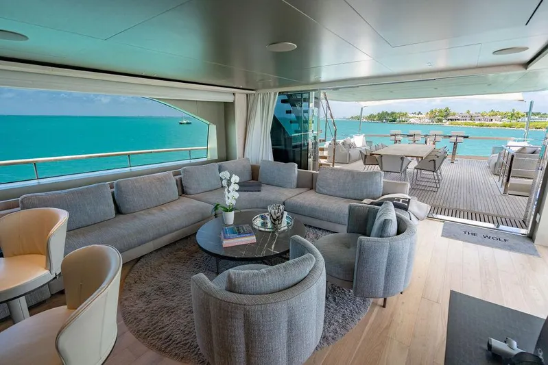 The Wolf Yacht Photos Pics Luxurious 2023 Sanlorenzo SD118 yacht interior with elegant seating and ocean view.