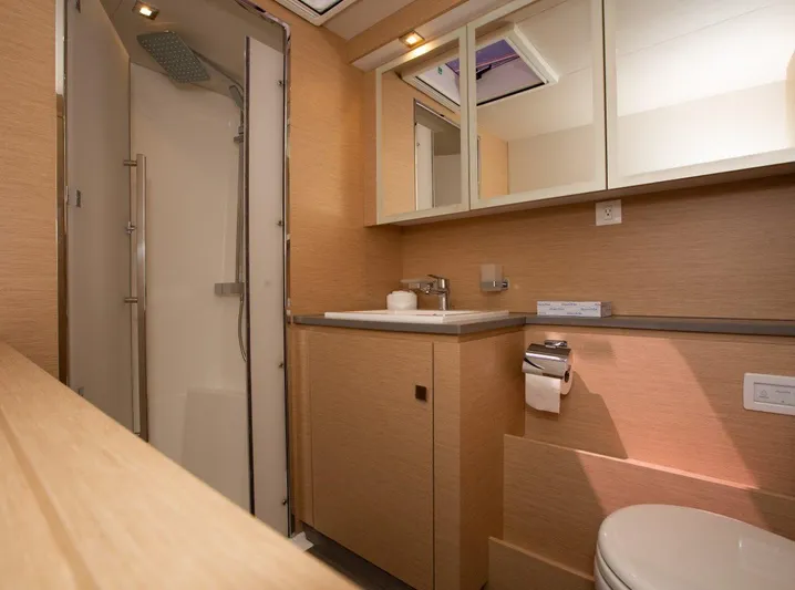Wild Blue Yacht Photos Pics Luxurious bathroom in 2019 Fountaine Pajot MY 44 yacht with modern fixtures and shower.