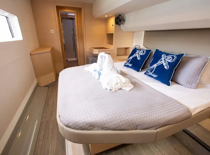 Wild Blue Yacht Photos Pics Luxurious cabin interior of 2019 Fountaine Pajot MY 44 yacht with elegant bedding.