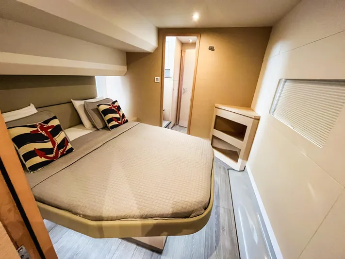 Wild Blue Yacht Photos Pics Luxurious cabin interior of 2019 Fountaine Pajot MY 44 yacht with nautical-themed decor.