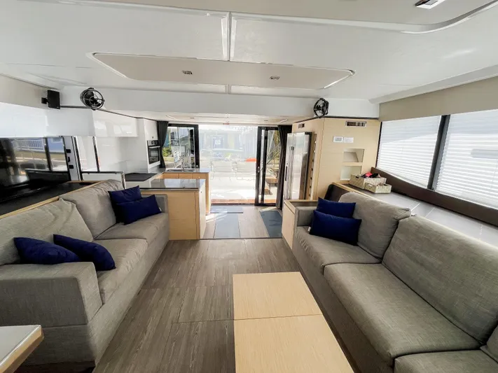 Wild Blue Yacht Photos Pics Luxurious interior of 2019 Fountaine Pajot MY 44 yacht with modern furnishings and spacious layout.