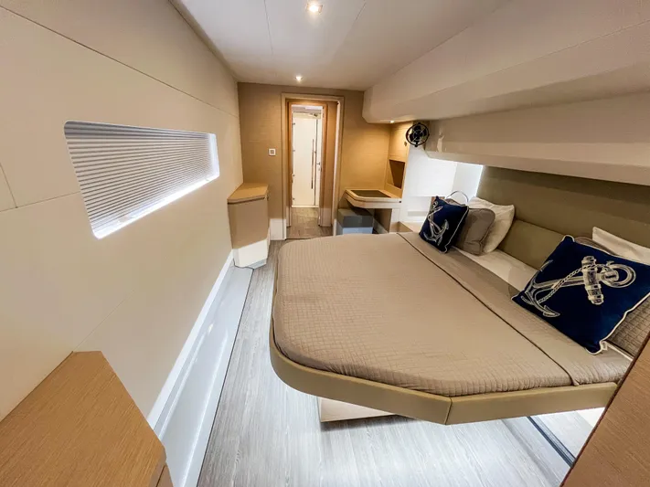 Wild Blue Yacht Photos Pics Luxurious cabin interior of 2019 Fountaine Pajot MY 44 yacht with modern design and cozy bedding.