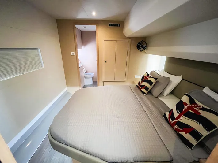 Wild Blue Yacht Photos Pics Luxurious bedroom in 2019 Fountaine Pajot MY 44 yacht with modern decor and ensuite bathroom.