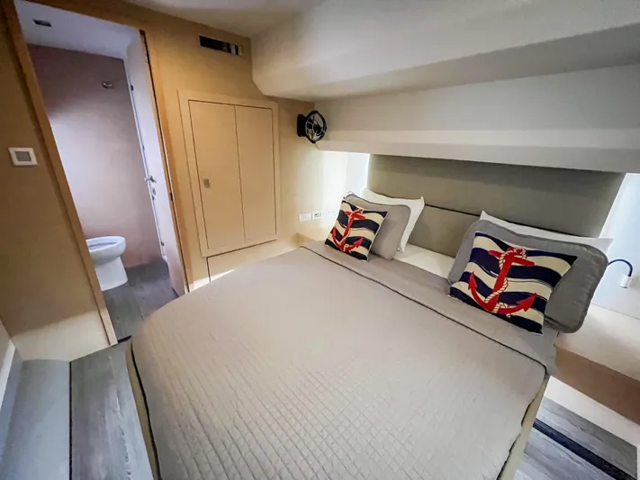 Wild Blue Yacht Photos Pics Luxurious bedroom in 2019 Fountaine Pajot MY 44 yacht with nautical-themed decor.