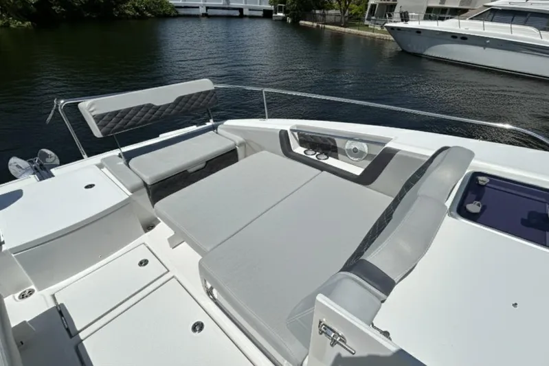  Yacht Photos Pics Aquila 36 Sport 2020 boat interior with cushioned seating and water view.
