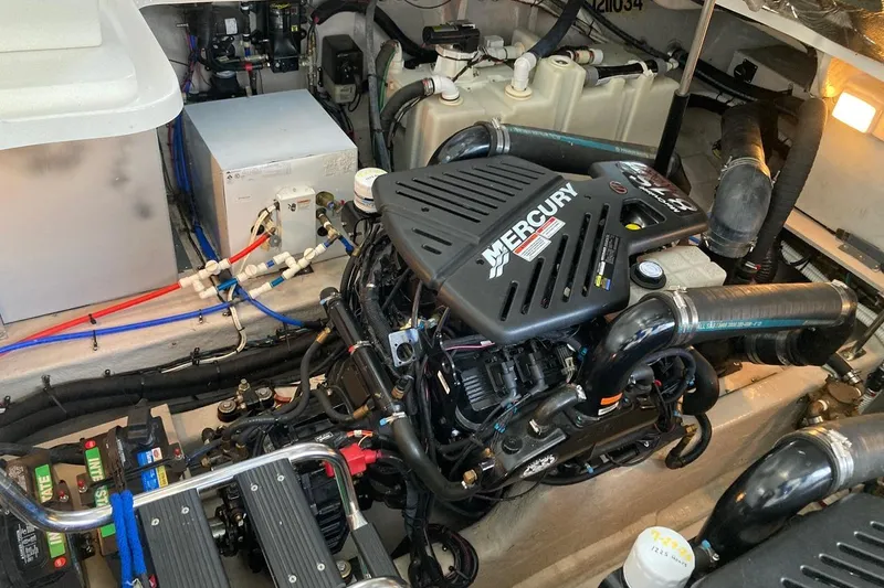 Co Motion Yacht Photos Pics Engine room of 2008 Sea Ray 44 Sundancer with Mercury engine and various components.