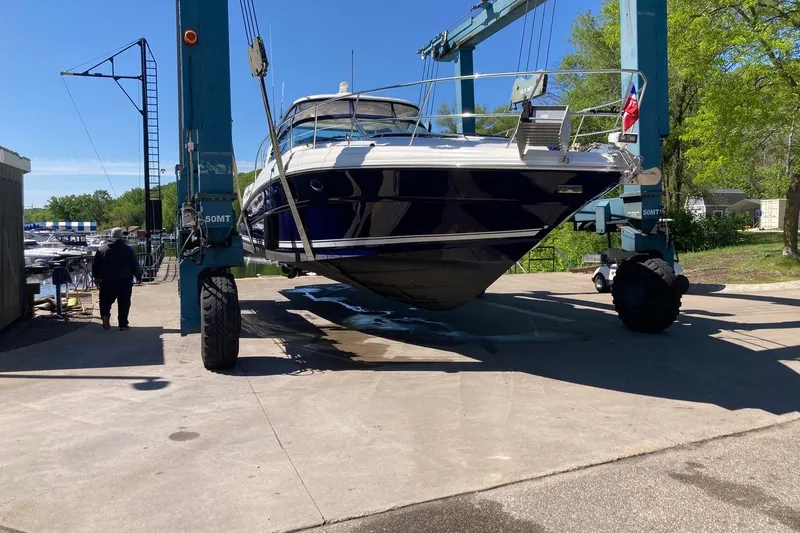 Co Motion Yacht Photos Pics 2008 Sea Ray 44 Sundancer yacht lifted by crane at marina.