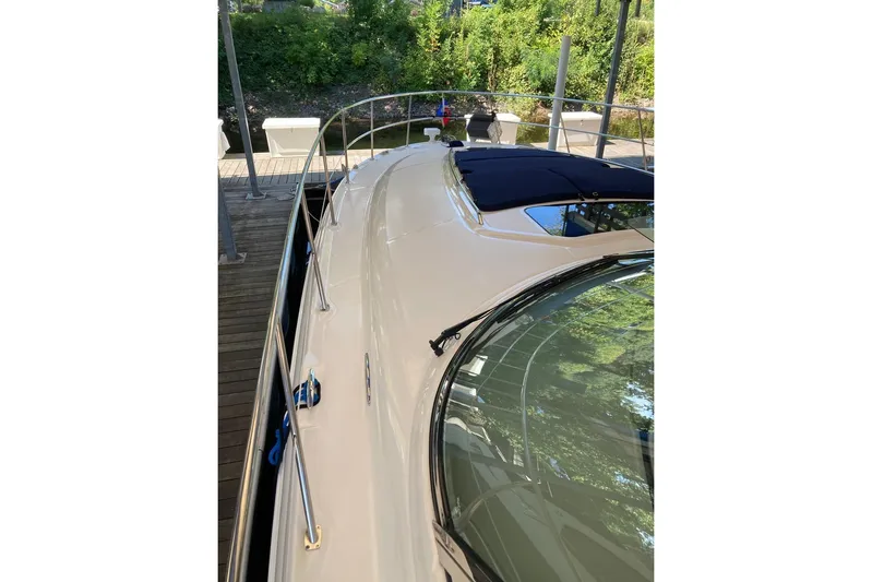 Co Motion Yacht Photos Pics 2008 Sea Ray 44 Sundancer yacht docked, showcasing sleek design and polished deck.