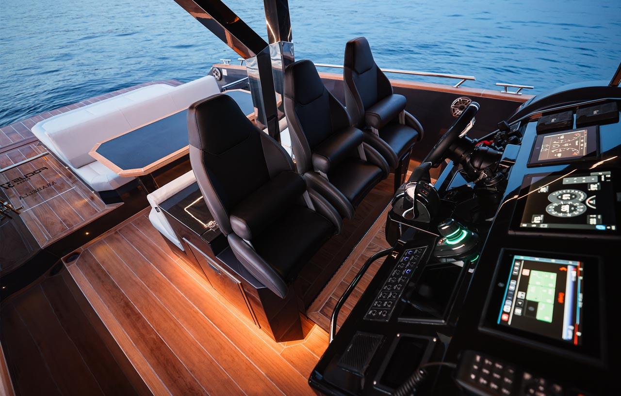 Luxurious 2023 Focus Forza 37 yacht interior with modern navigation controls and seating.