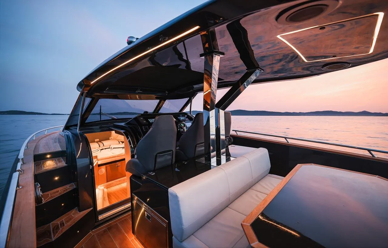 Luxurious 2023 Focus Forza 37 yacht interior at sunset, featuring sleek design and modern amenities.