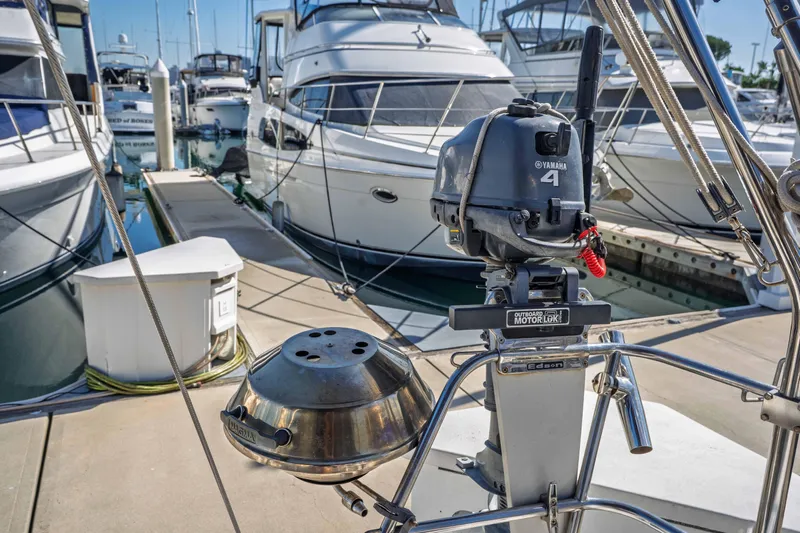 "champagne" Yacht Photos Pics Jeanneau Sun Odyssey 45.2 sailboat with Yamaha outboard motor at marina, 2003 model.