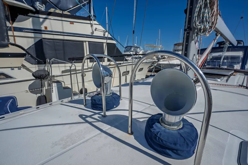 "champagne" Yacht Photos Pics Deck view of 2003 Jeanneau Sun Odyssey 45.2 sailboat in marina.