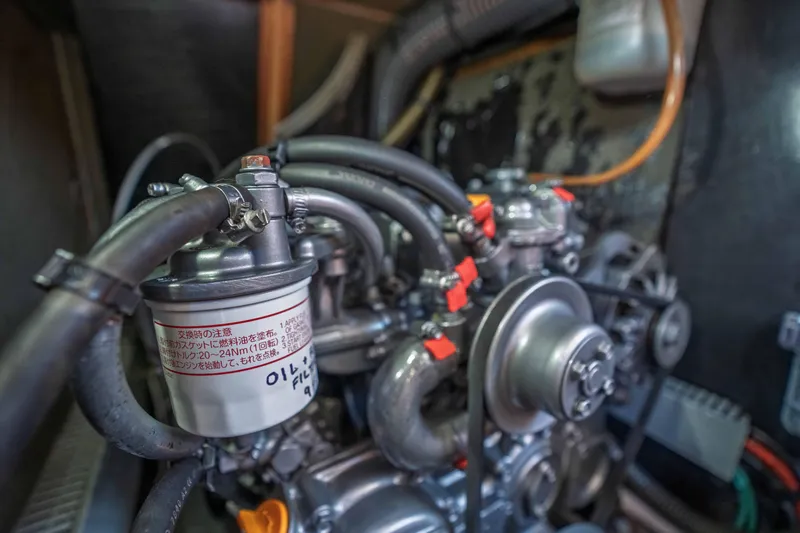 "champagne" Yacht Photos Pics Engine compartment of 2003 Jeanneau Sun Odyssey 45.2 sailboat, showing detailed components.