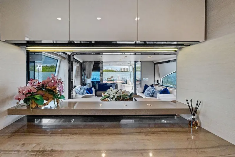 Deep Blue Yacht Photos Pics Luxurious interior of 2018 Azimut Flybridge yacht with elegant decor and scenic water view.
