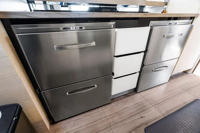 Deep Blue Yacht Photos Pics Modern kitchen appliances in a 2018 Azimut Flybridge yacht interior.