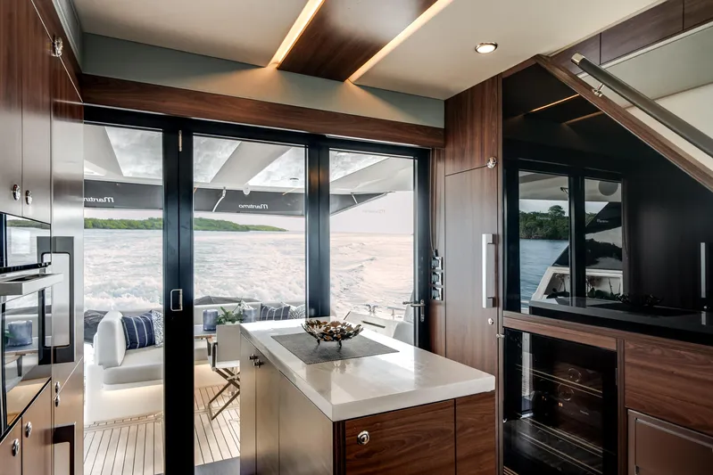 Godspeed Yacht Photos Pics Luxurious interior of 2024 Maritimo M55 yacht with ocean view and modern design.