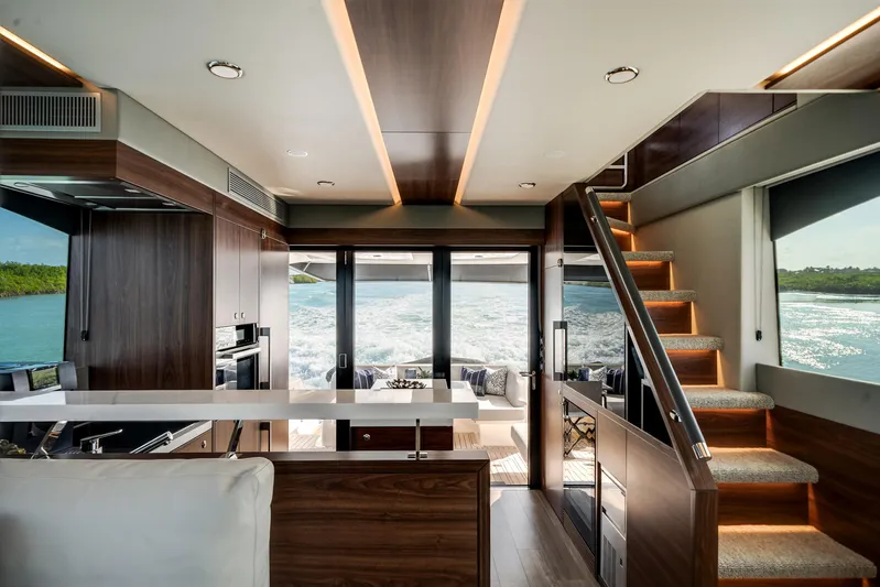 Godspeed Yacht Photos Pics Luxurious interior of 2024 Maritimo M55 yacht with modern design and scenic ocean view.